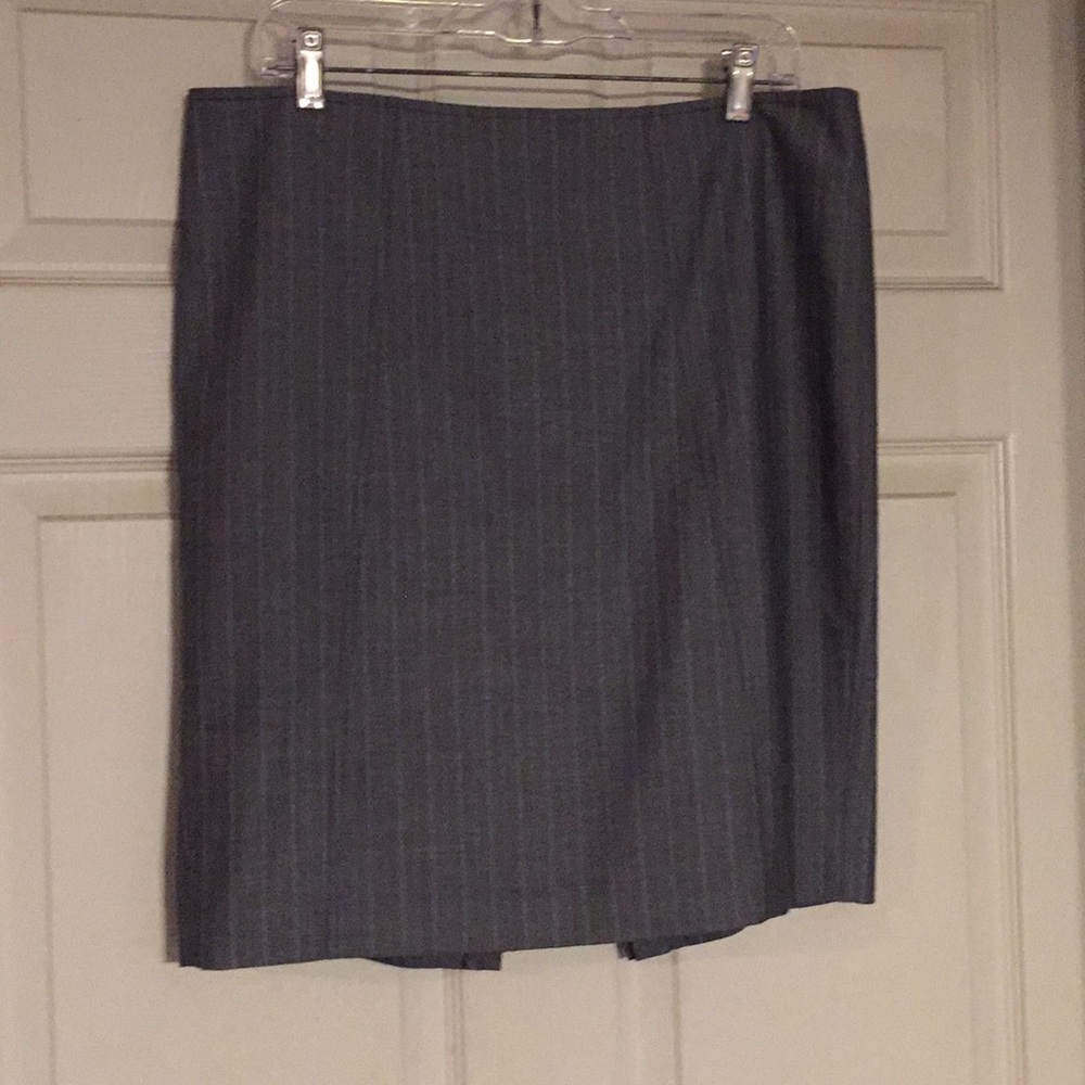 Pinstripe grey skirt.